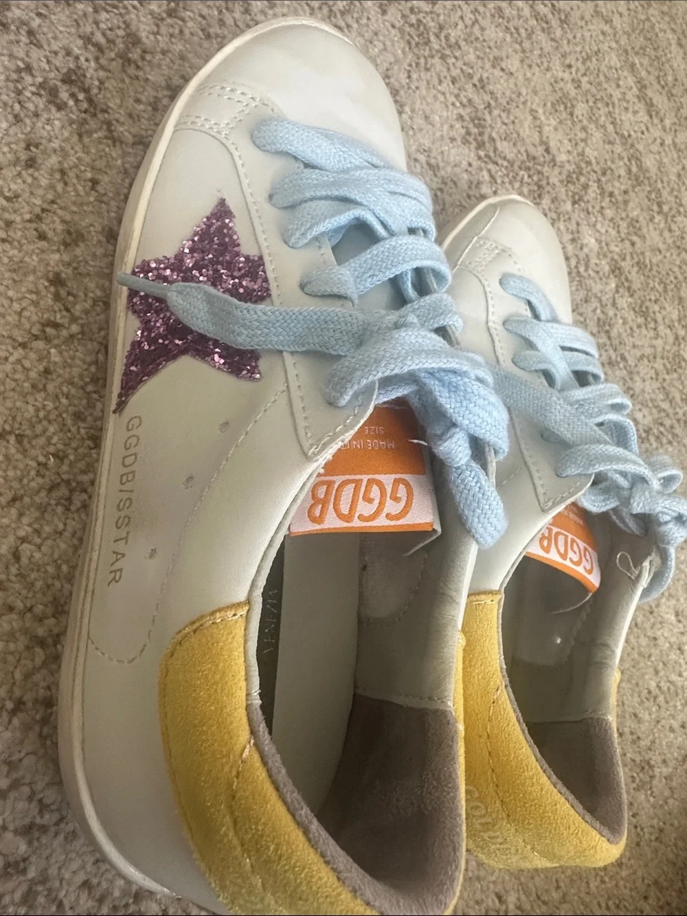 Golden Goose featuring white